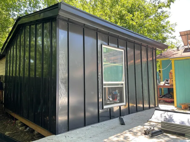 Black standing seam metal wall panels for Roof Inspection in Crete